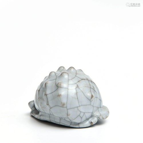 A Chinese Porcelain Sea snail Ornament