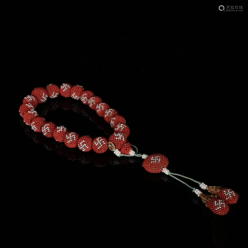 A Chinese red coral Beads Hand String