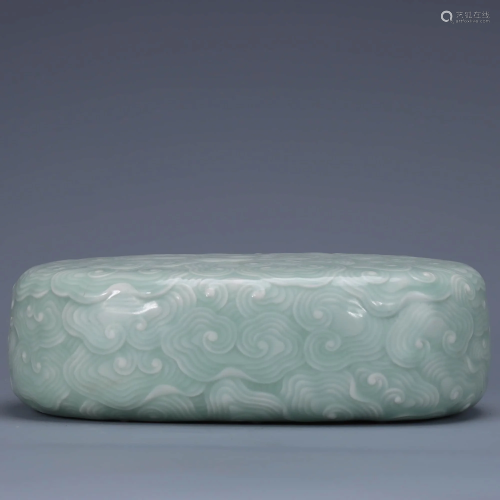A Chinese Cyan Glaze Carved Porcelain Pulse-taking