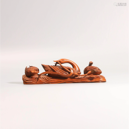 A Chinese Boxwood Carved Duck Shaped Paper …