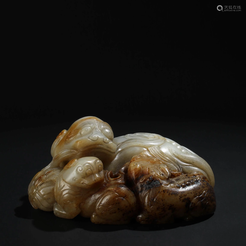 A Chinese Hetian Jade Carved Lion Ornament