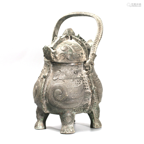 A Chinese Bird Shaped Bronze Loop-handle Utensil