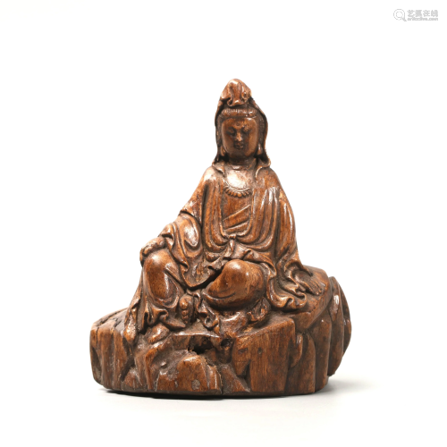 A Chinese Eaglewood Carved Guanyin Statue