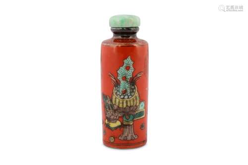 A CHINESE FAMILLE VERTE RED-GROUND SNUFF BOTTLE.