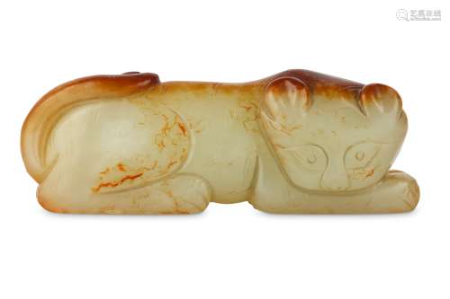 A CHINESE PALE CELADON CARVING OF A CAT.