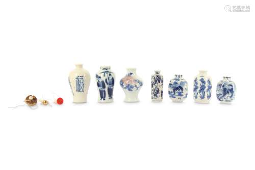 FOUR CHINESE BLUE AND WHITE SNUFF BOTTLES AND THREE MINIATURE VASES.