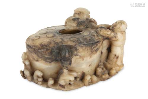 A CHINESE CREAM JADE 'LOTUS AND BOYS' WASHER.