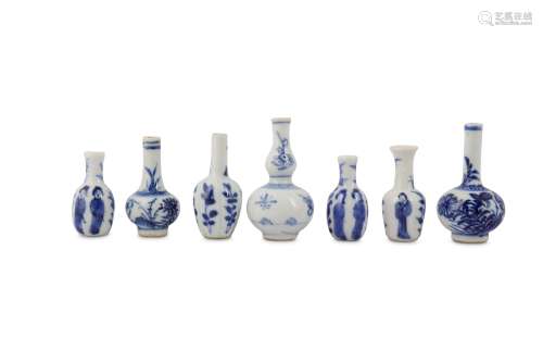 SEVEN CHINESE BLUE AND WHITE MINIATURE VASES.