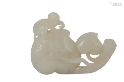 † A CHINESE WHITE JADE 'MONKEY AND PEACHES' CARVING.
