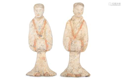 A PAIR OF CHINESE POTTERY FIGURES OF SERVANTS.