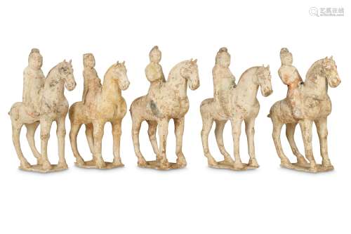 FIVE CHINESE POTTERY HORSES AND RIDERS.