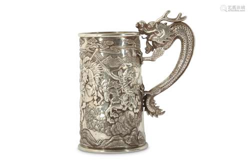 A CHINESE SILVER 'DRAGON' TANKARD.