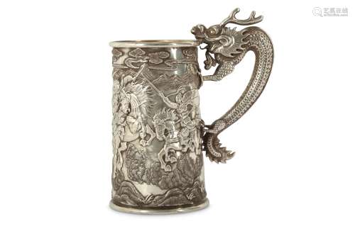 A CHINESE SILVER 'DRAGON' TANKARD.