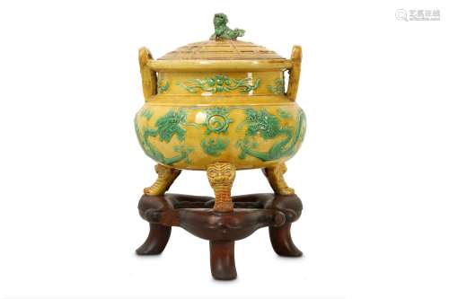 A CHINESE GREEN AND YELLOW-GLAZED 'DRAGON' INCENSE BURNER AND COVER.