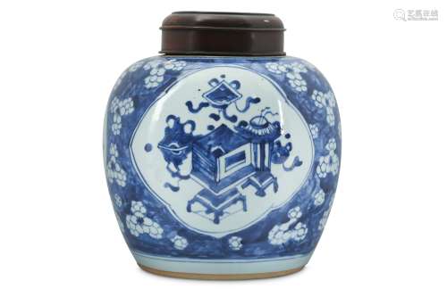 A CHINESE BLUE AND WHITE PRUNUS JAR AND WOOD COVER.