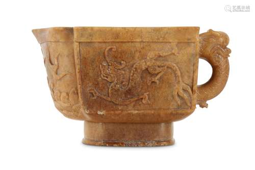 A CHINESE SOAPSTONE ARCHAISTIC 'DRAGON' POURING VESSEL.