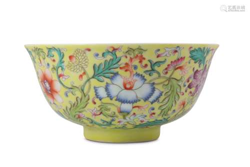 A CHINESE FAMILLE ROSE YELLOW-GROUND 'BLOSSOMS' BOWL.