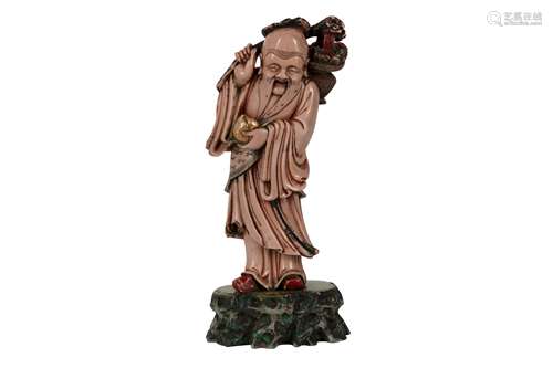 A CHINESE SOAPSTONE FIGURE OF SHOULAO.