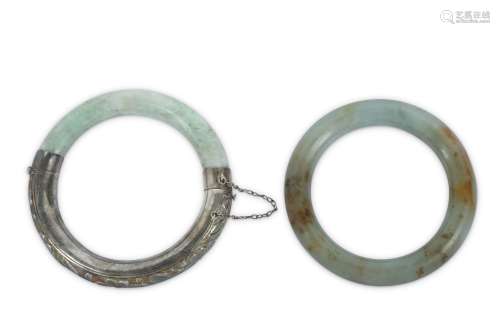 TWO CHINESE HARDSTONE BANGLES.