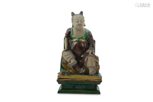 A CHINESE FAMILLE VERTE SANCAI FIGURE OF AN IMMORTAL.