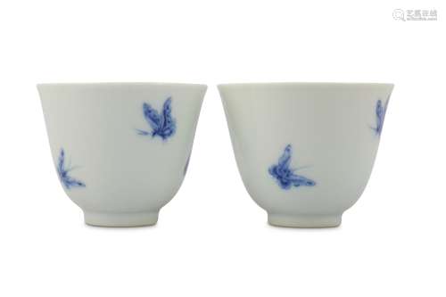 A PAIR OF CHINESE BLUE AND WHITE 'BUTTERFLY' CUPS.