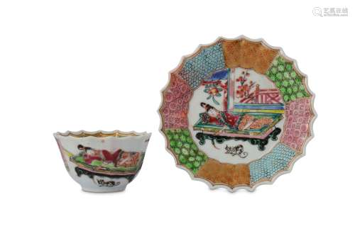 † A CHINESE FAMILLE ROSE 'LADY AND KITTEN' CUP AND SAUCER.