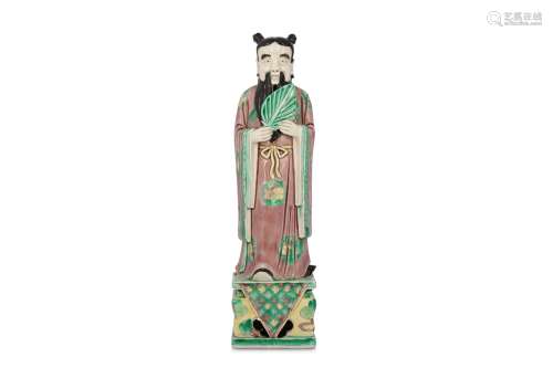 A CHINESE FAMILLE VERTE BISCUIT FIGURE OF AN IMMORTAL.
