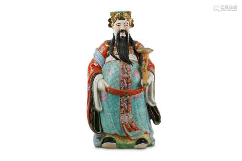 A CHINESE FAMILLE ROSE FIGURE OF AN IMMORTAL.