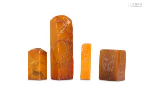 FOUR CHINESE ORANGE STONE SEALS.