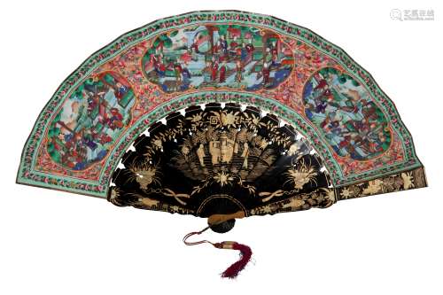 A CHINESE PAPER AND LACQUER FAN.