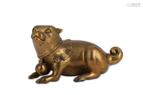 A BRONZE FIGURE OF A SEATED DOG.