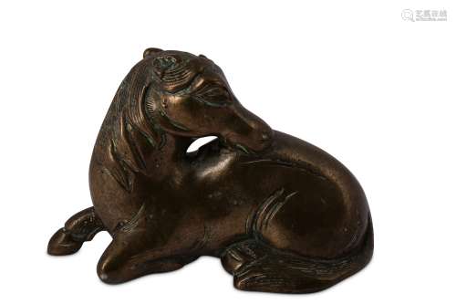 † A CHINESE BRONZE 'HORSE' PAPERWEIGHT.