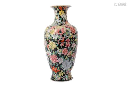 A CHINESE FAMILLE ROSE BLACK-GROUND 'MILLEFLEUR' VASE.
