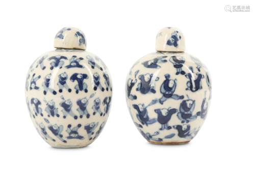 A PAIR OF CHINESE BLUE AND WHITE 'BOYS' JARS AND COVERS.