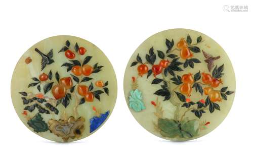 A PAIR OF CHINESE HARDSTONE-INLAID PALE CELADON JADE CIRCULAR PANELS.