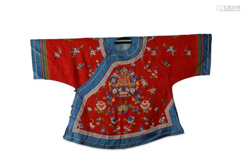 A CHINESE EMBROIDERED RED-GROUND SILK JACKET.