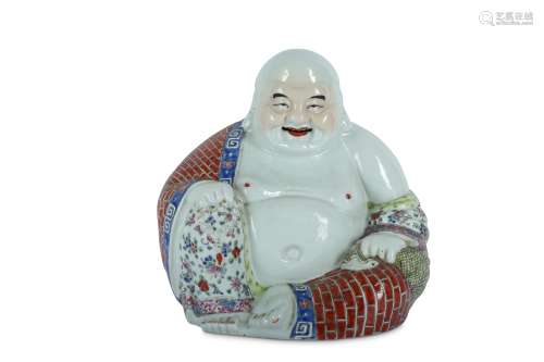 A CHINESE FAMILLE ROSE FIGURE OF BUDAI HESHANG.