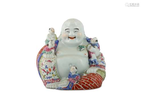 A CHINESE FAMILLE ROSE FIGURE OF BUDAI HESHANG WITH FIVE BOYS.