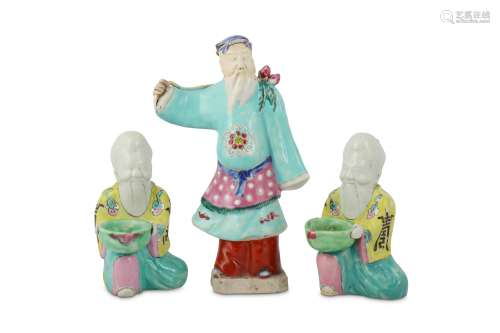 THREE CHINESE FAMILLE ROSE FIGURES OF IMMORTALS.