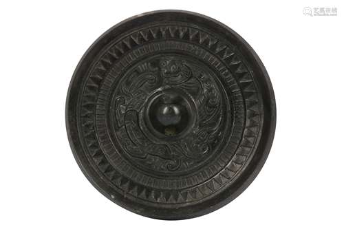 A CHINESE BRONZE MIRROR.