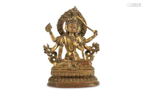 A GILT-BRONZE FIGURE OF USHNISHAVIJAYA.