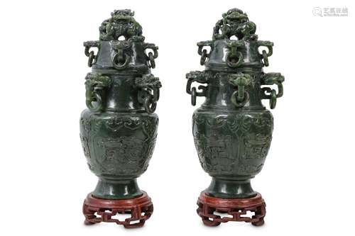 A PAIR OF CHINESE SPINACH JADE 'DRAGON' VASES AND COVERS.