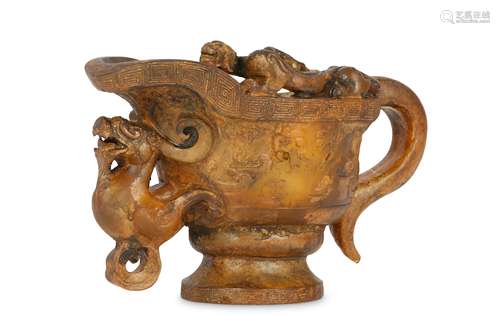 A CHINESE GILT-DECORATED ARCHAISTIC 'DRAGON' POURING VESSEL.