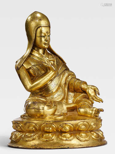 A GILT COPPER ALLOY FIGURE OF THE SIXTH SAKYA TRIDZIN, SAKYA PANDITA KUNGA GYALTSEN TIBET, POSSIBLY GONGKAR CHOEDE MONASTERY, 15TH CENTURY