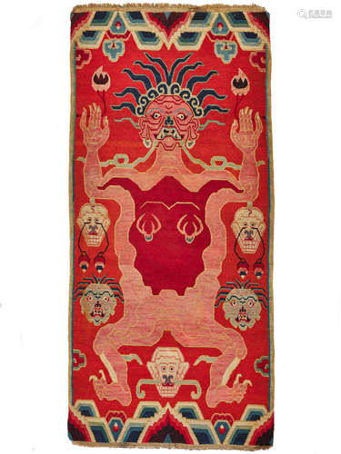 A WOOL TANTRIC CARPET OF A FLAYED FEMALE DEITY TIBET, 19TH CENTURY