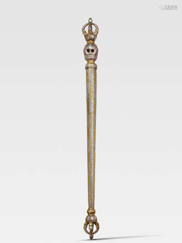 A GOLD AND SILVER DAMASCENED IRON KAPALA DANDA DERGE, EASTERN TIBET, 15TH CENTURY