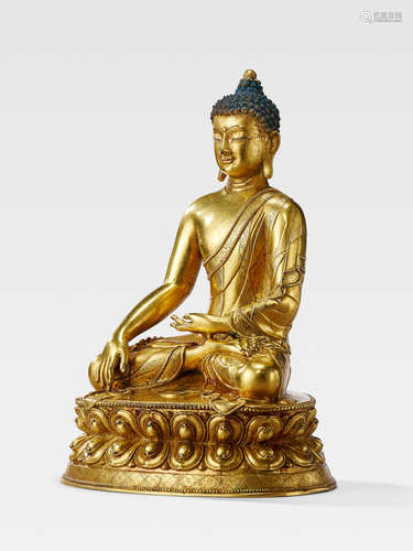 A GILT COPPER ALLOY FIGURE OF SHAKYAMUNI BUDDHA TIBET, 15TH/16TH CENTURY