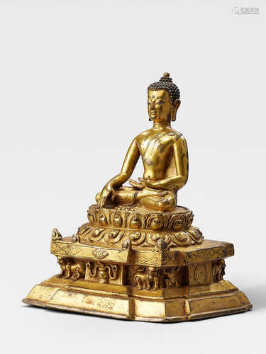 A GILT COPPER ALLOY SHRINE OF AKSHOBHYA TIBET, CIRCA 14TH CENTURY