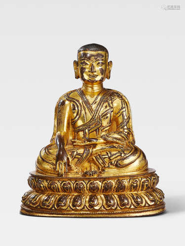 A GILT COPPER ALLOY FIGURE OF A TAKLUNG LAMA TIBET, 14TH CENTURY