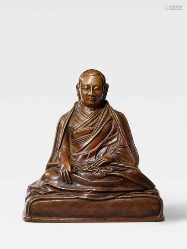 A COPPER ALLOY FIGURE OF A KARMA KAGYU LAMA, POSSIBLY THE SIXTH SHAMARPA, MIPAM CHOKYI WANGCHUK TIBET, 17TH CENTURY